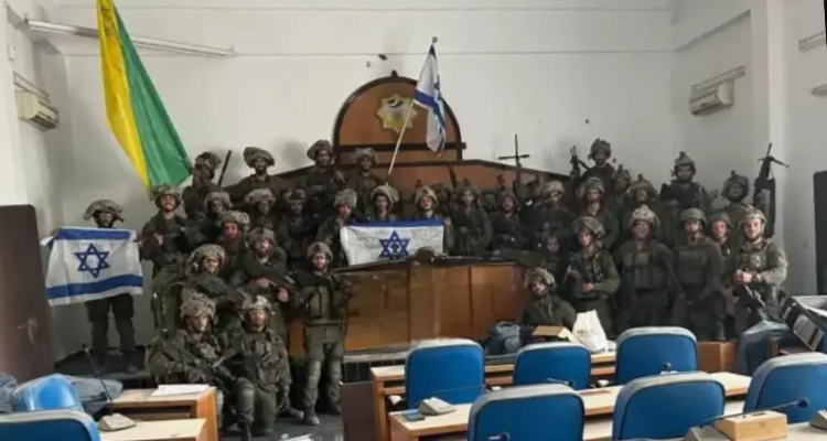 IDF soldiers share photo in conquered Hamas parliament